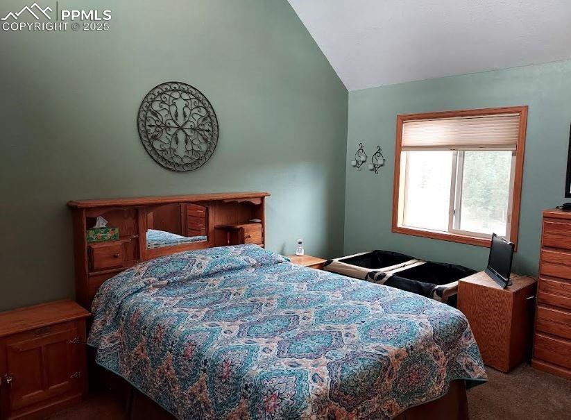 Image 10 of 16: Bedroom up stairs