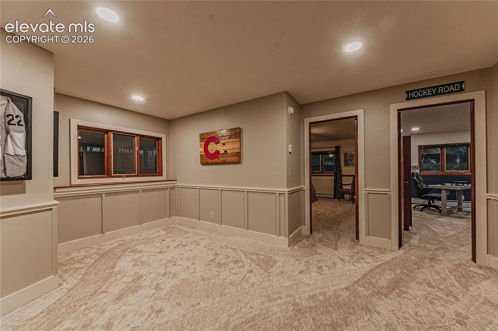 Image 29 of 43: Unfurnished room featuring light colored carpet