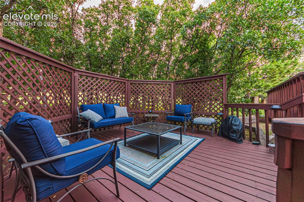Image 42 of 43: Wooden terrace featuring outdoor lounge area