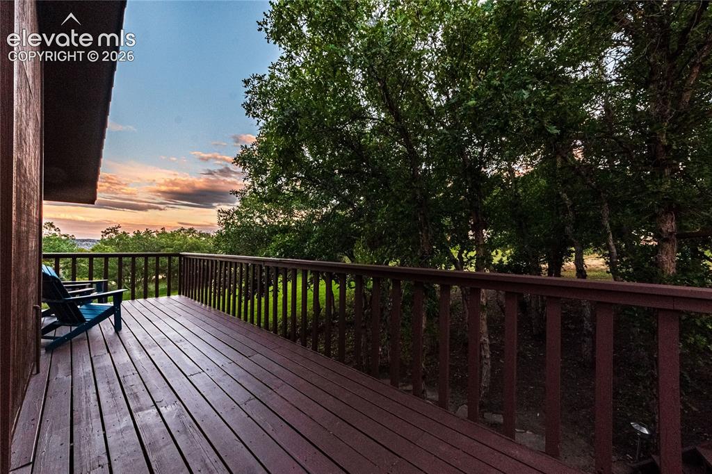 Image 43 of 43: View of deck at dusk