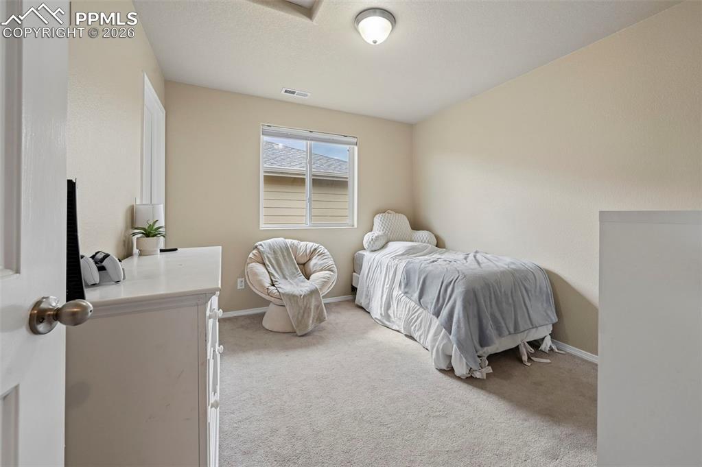 Image 23 of 48: Bedroom