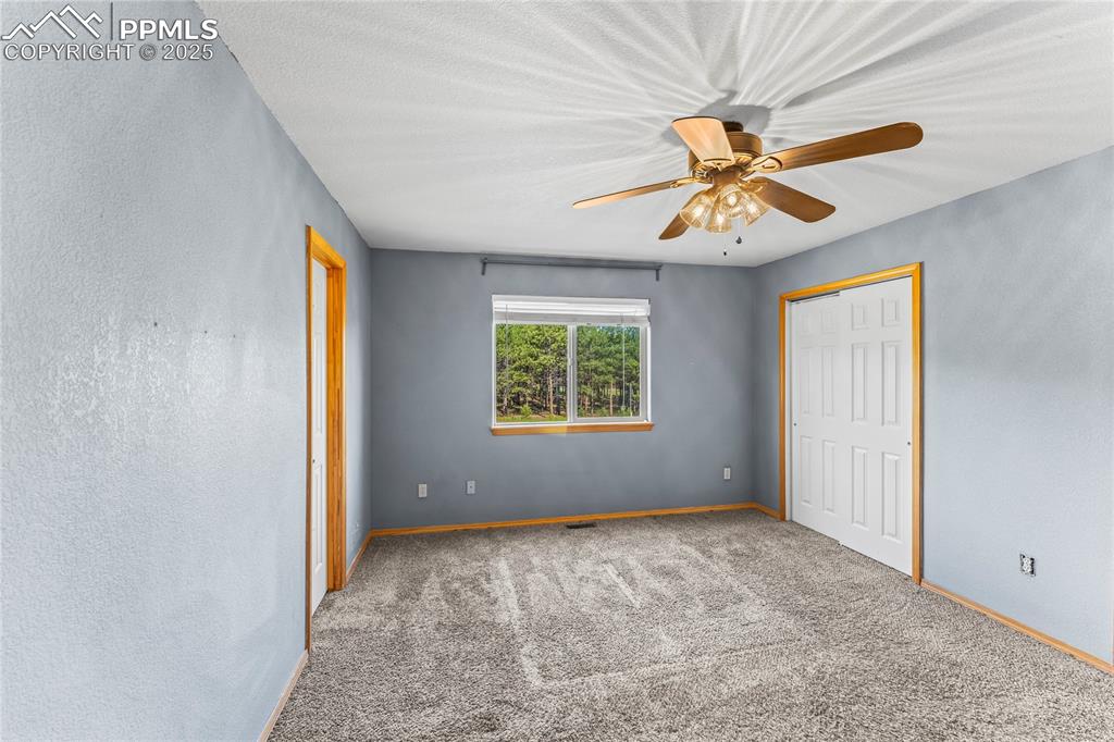 Image 23 of 37: 2nd Floor Unfurnished bedroom featuring carpet floors, a closet, and ceilin