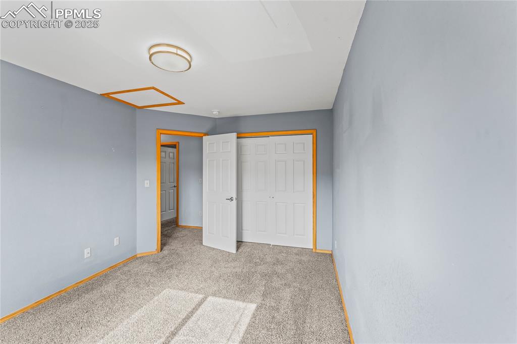 Image 27 of 37: 2nd Floor Unfurnished bedroom with carpet and a closet