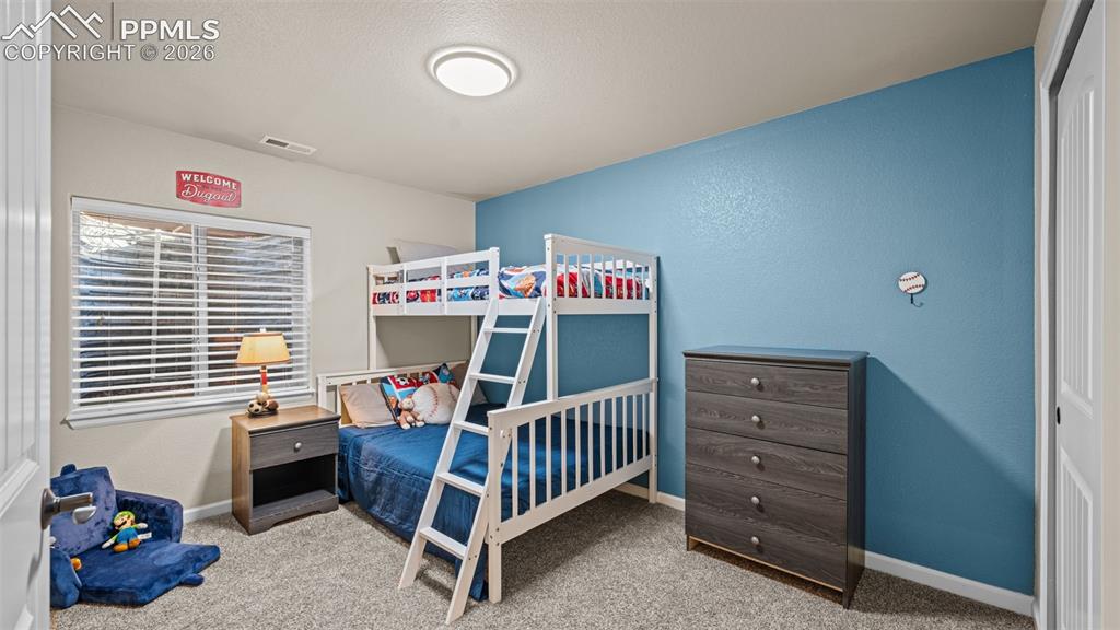 Image 21 of 27: second bedroom in basement