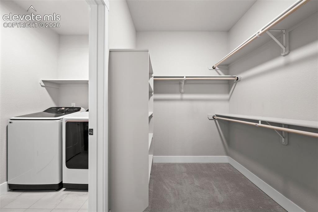 Image 20 of 42: Primary Walk-In Closet