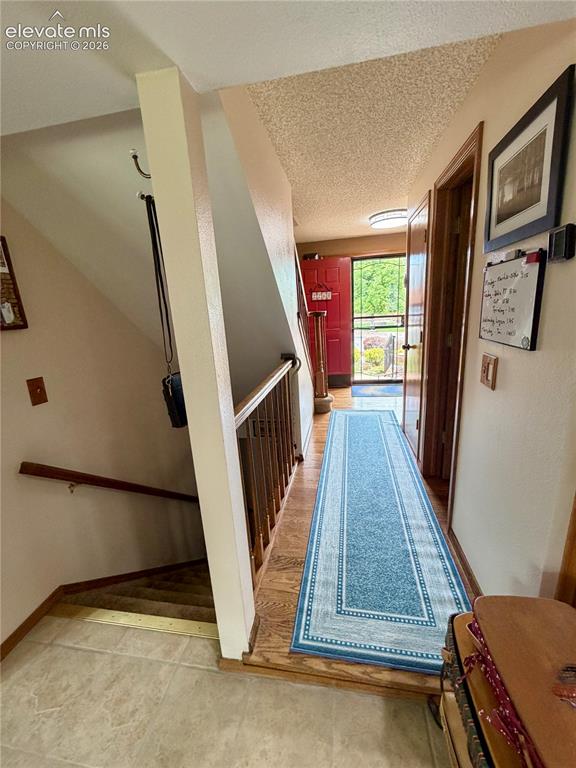 Image 15 of 49: Hardwood floors throughout front Entry way.