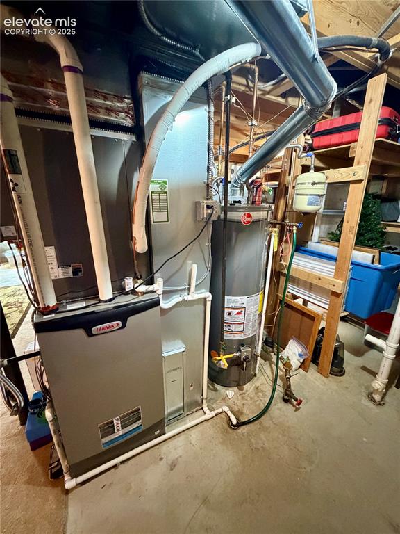 Image 46 of 49: Lennox high efficient furnace unit. Newer Hot Water Heater, Humidifier and 