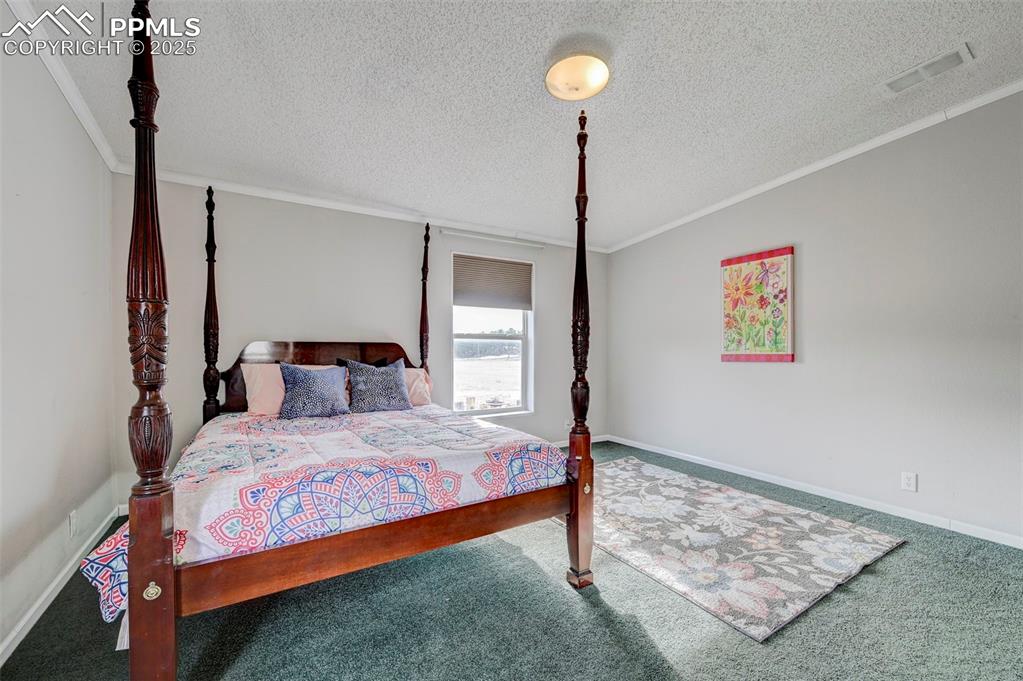 Image 13 of 46: Master Bedroom