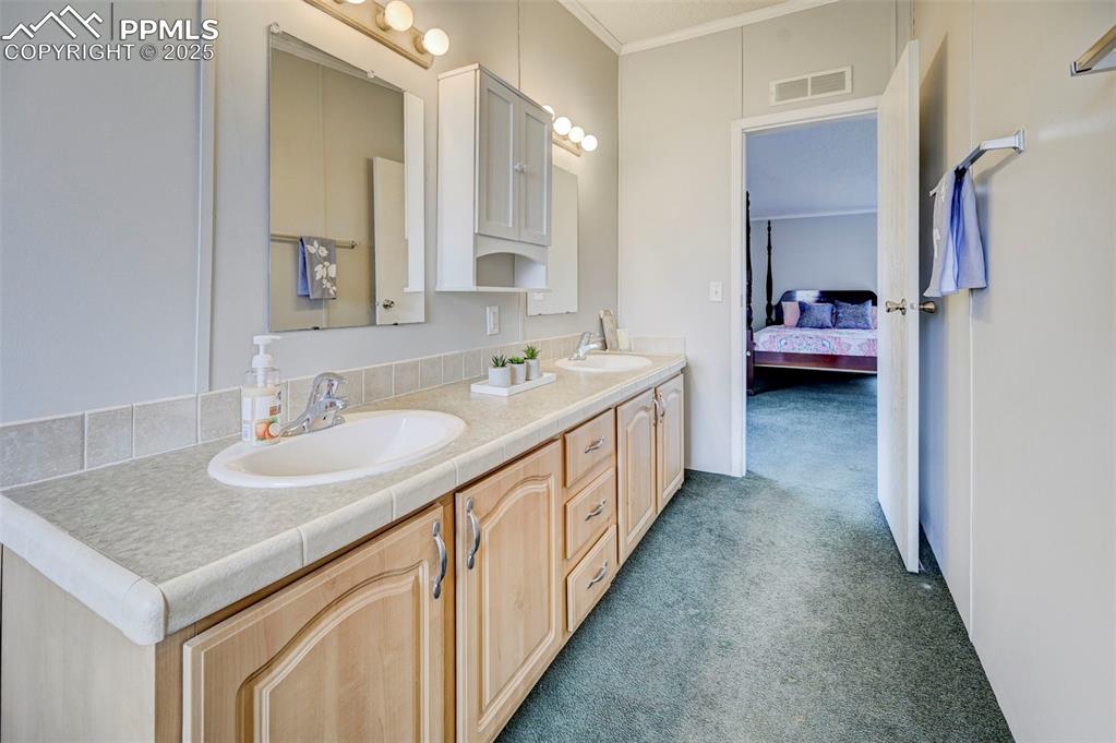 Image 17 of 46: Master Bathroom