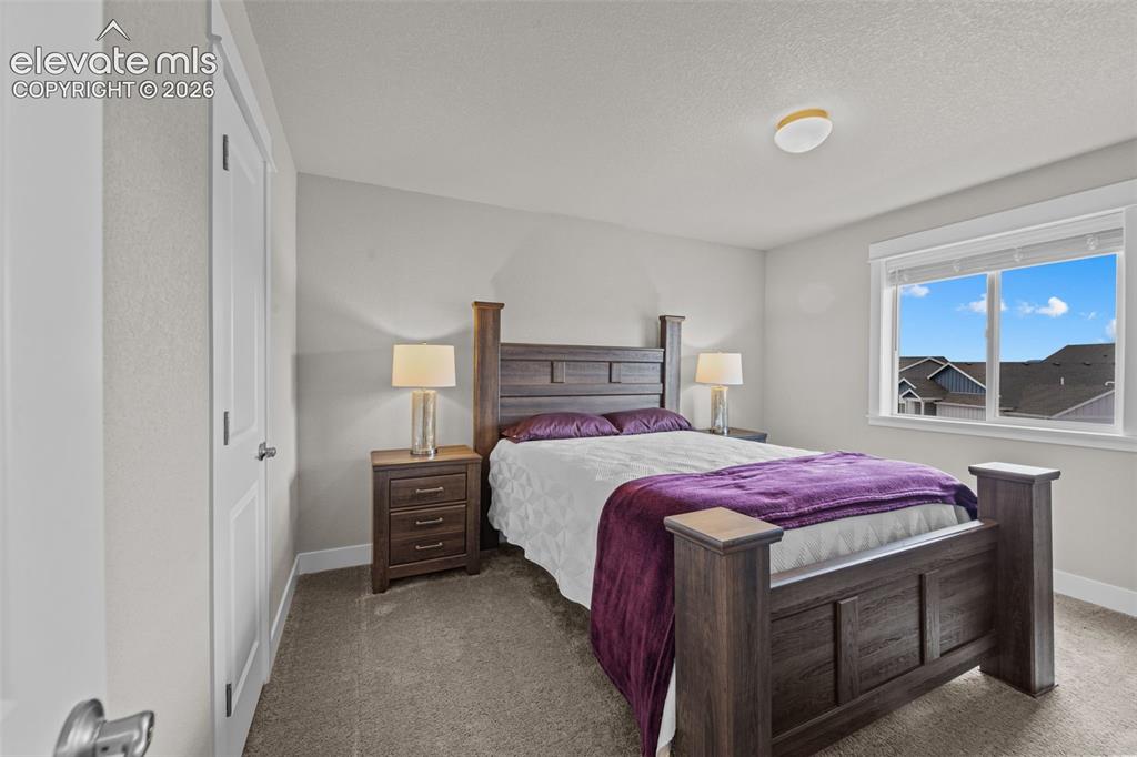 Image 23 of 46: Upstairs bedroom