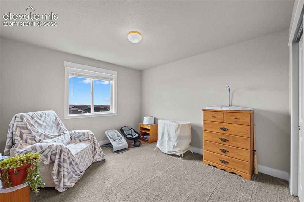 Image 26 of 46: upstairs bedroom