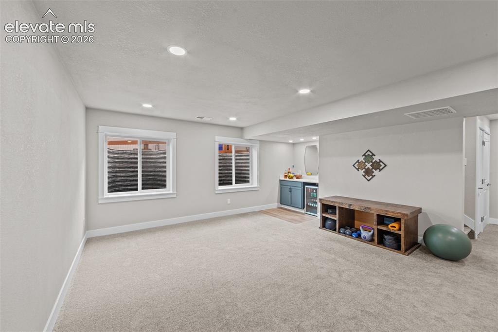 Image 28 of 46: basement family room