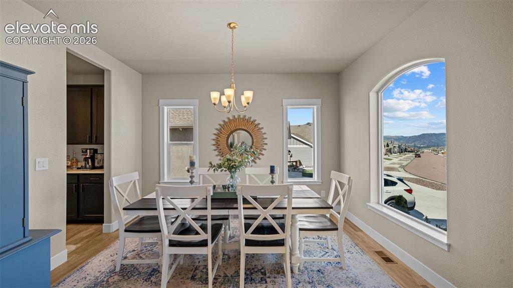 Image 4 of 46: Dining Room with mountain views