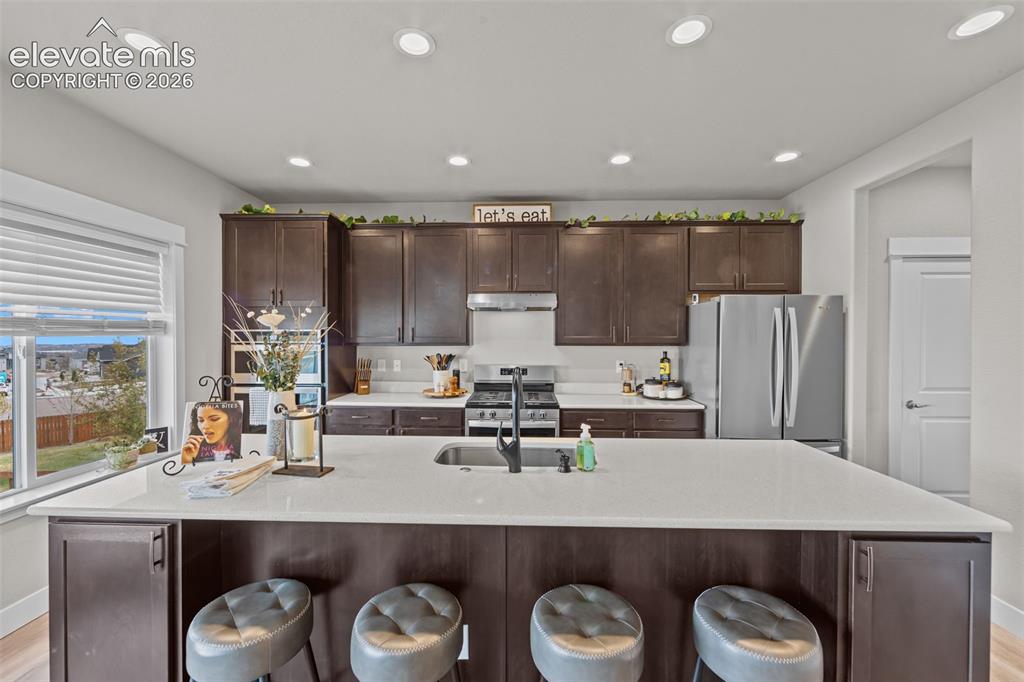 Image 7 of 46: Quartz Counters in this gorgeous kitchen