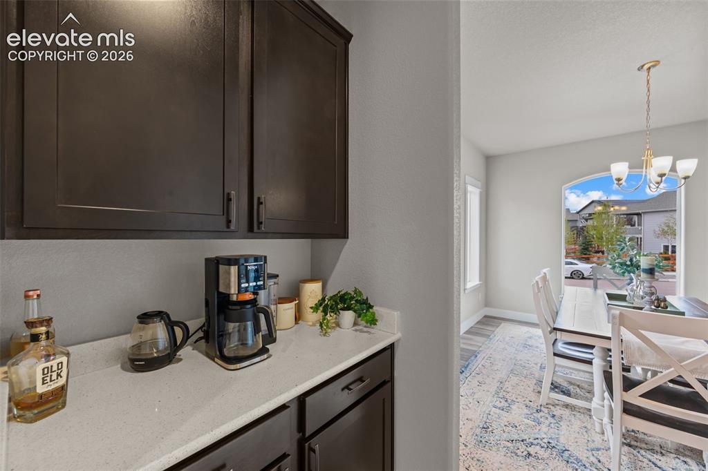 Image 9 of 46: Butlers Pantry between kitchen and formal dining room