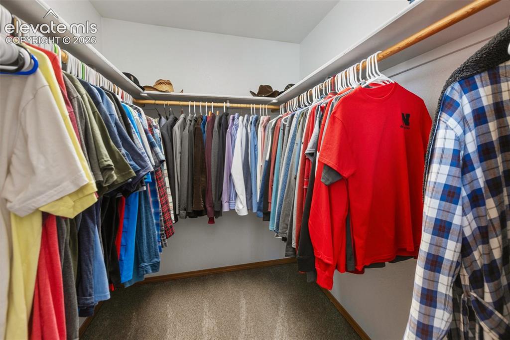 Image 15 of 36: Walk in closet