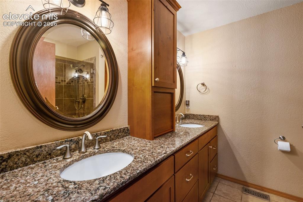 Image 16 of 36: Primary Bathroom