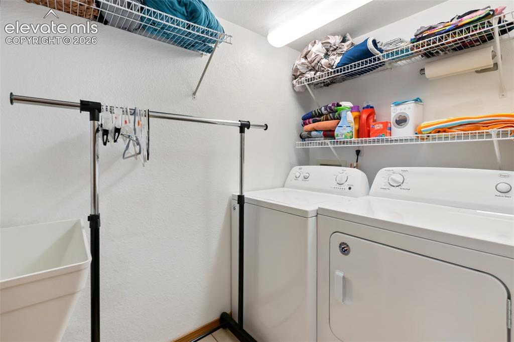 Image 26 of 36: Laundry Room with utility sink