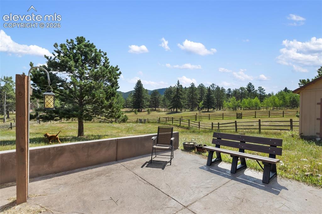 Image 29 of 36: Beautiful custom cement deck and view!