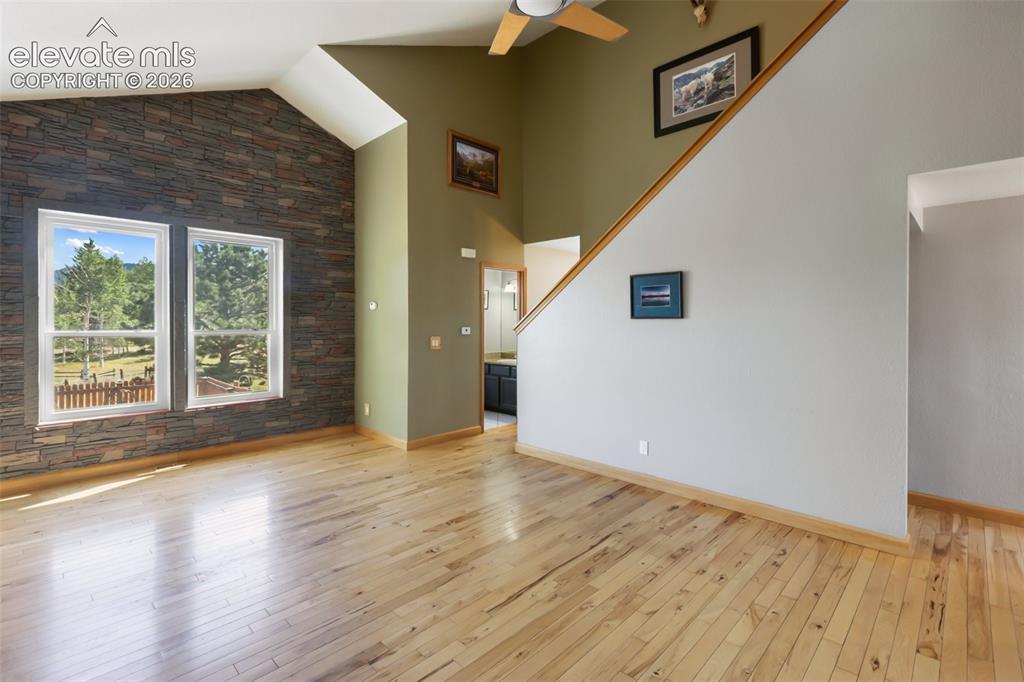 Image 4 of 36: Living room with vaulted ceilings!