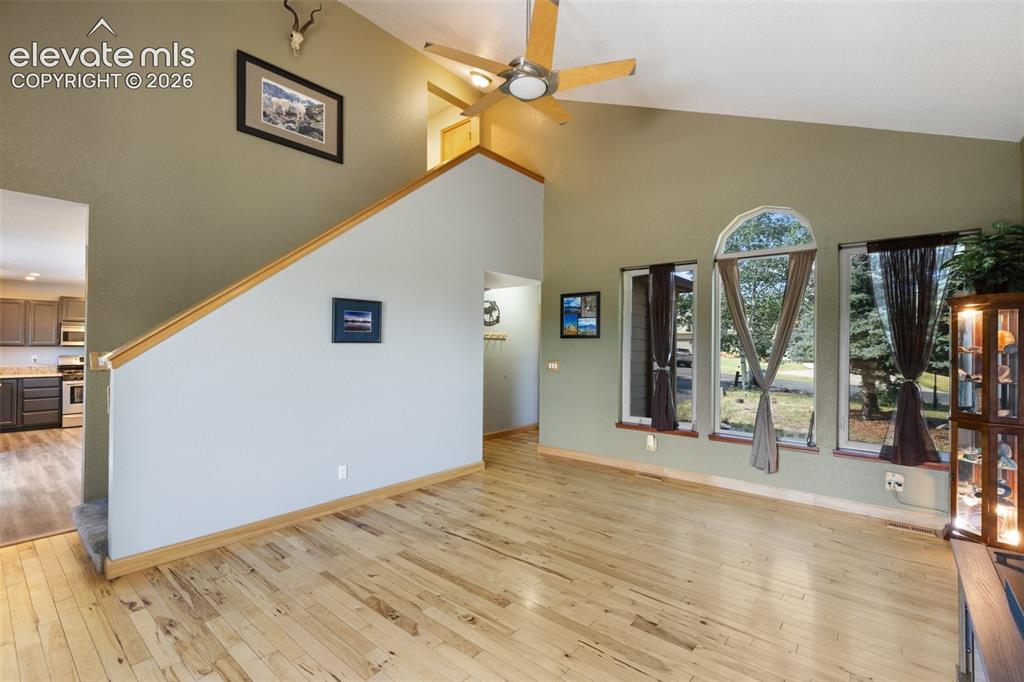 Image 8 of 36: Living room with vaulted ceilings!