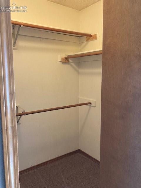 Image 15 of 28: Main Bedroom Walk In Closet