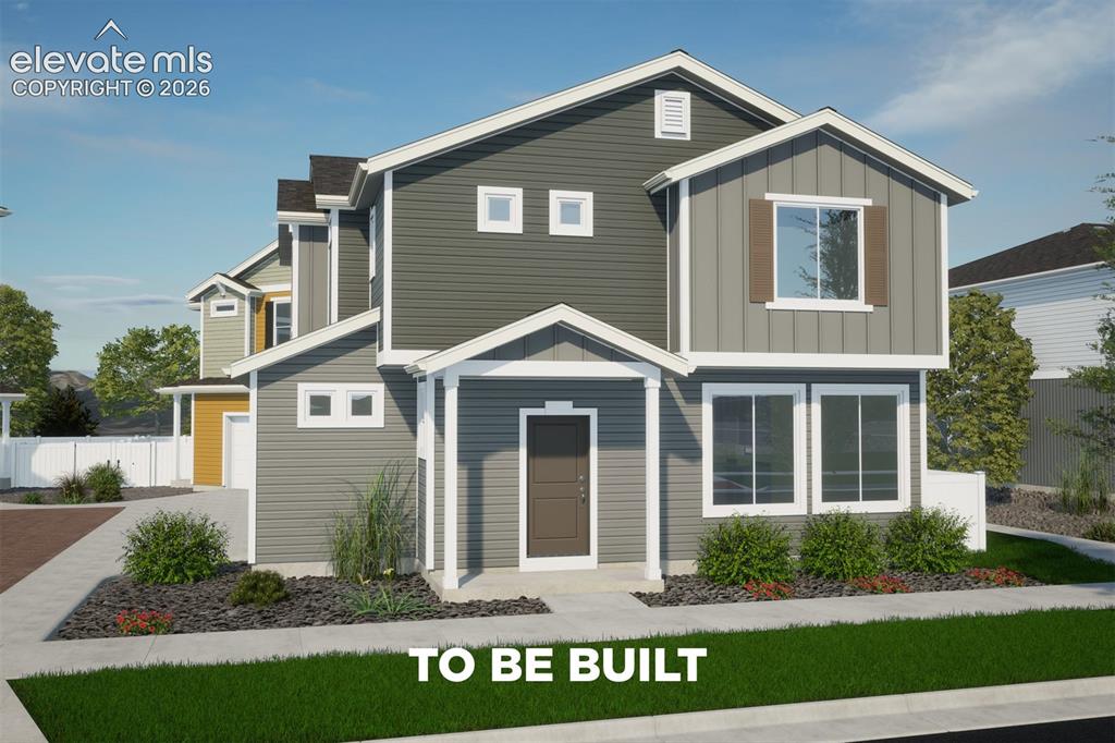 Caption: Modern exterior featuring multi-toned siding, a covered entry, and white-trimmed windows
