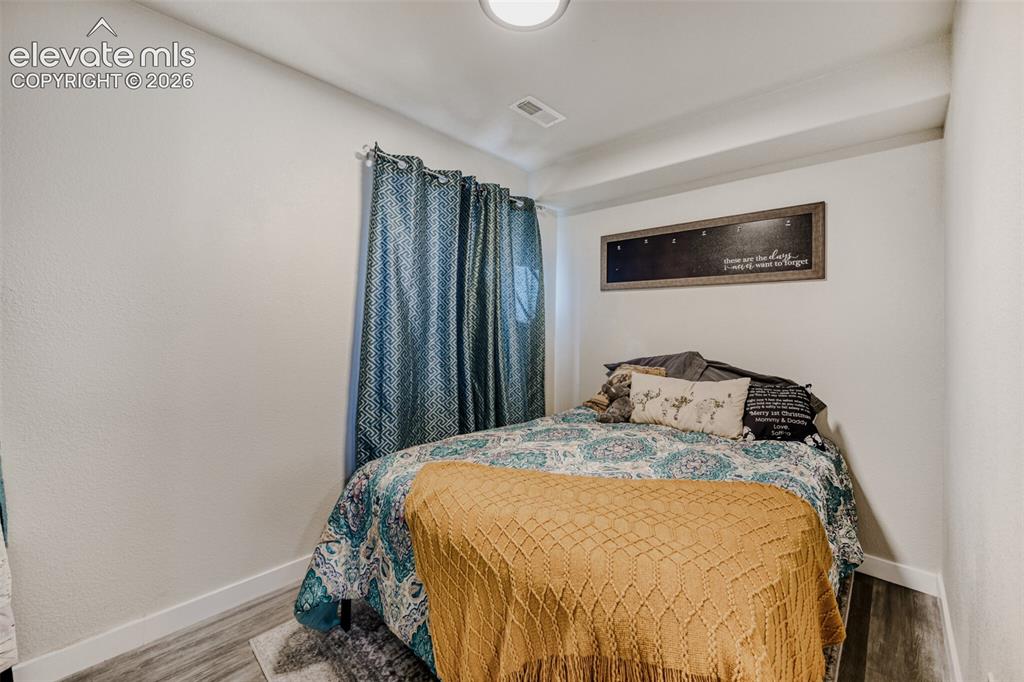 Image 12 of 21: Bedroom
