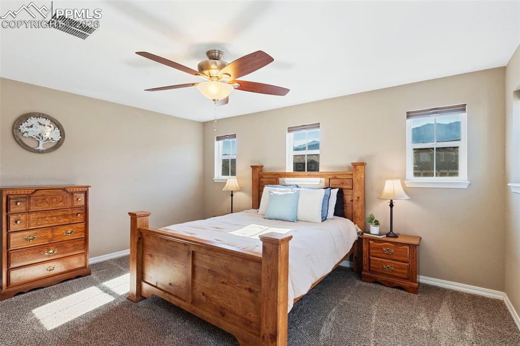 Image 6 of 45: Bedroom 3 has mountain and rock formation views