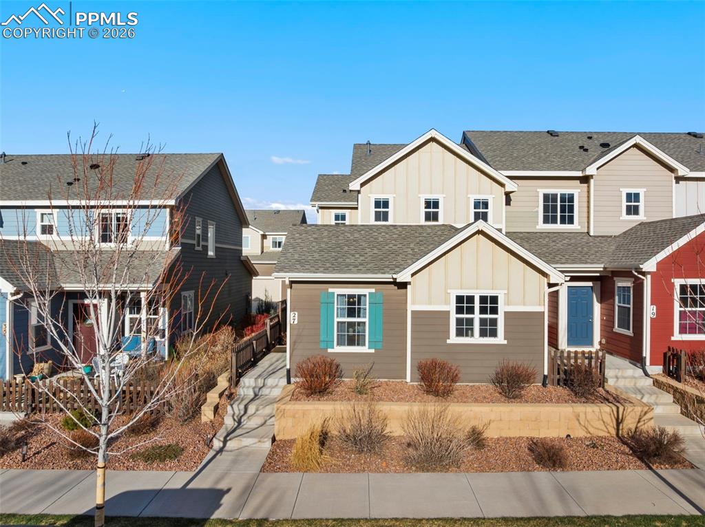 Image 7 of 45: Community maintained front landscaping 