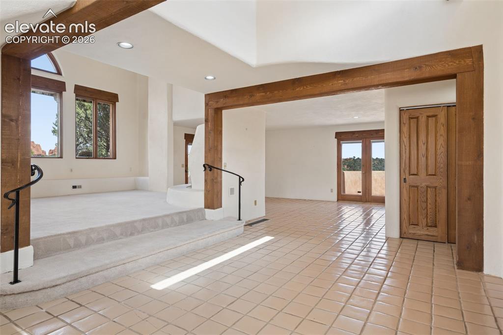 Image 10 of 46: Step inside to warm wood details and architectural character that immediate