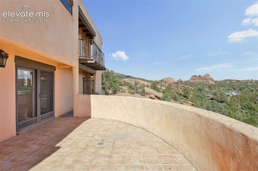 Image 23 of 46: The main deck provides another front row seat to Garden of the Gods and nat