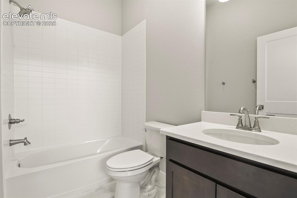 Image 14 of 40: Main level guest bath