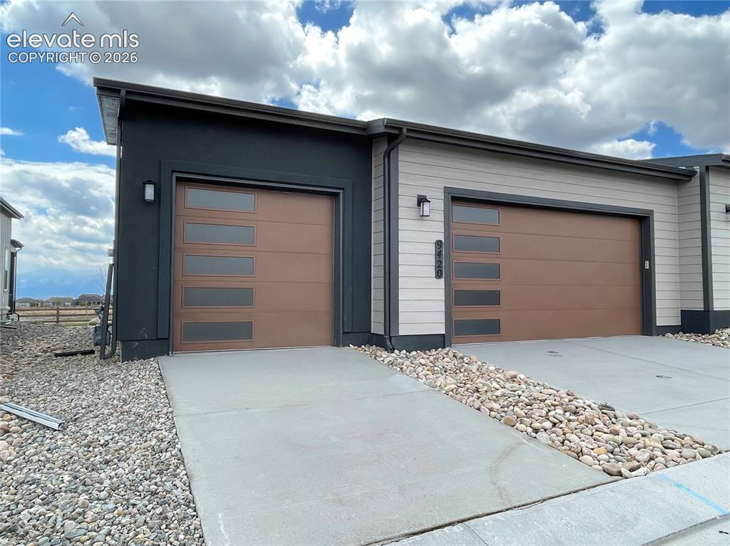 Image 23 of 40: True 3-car garage