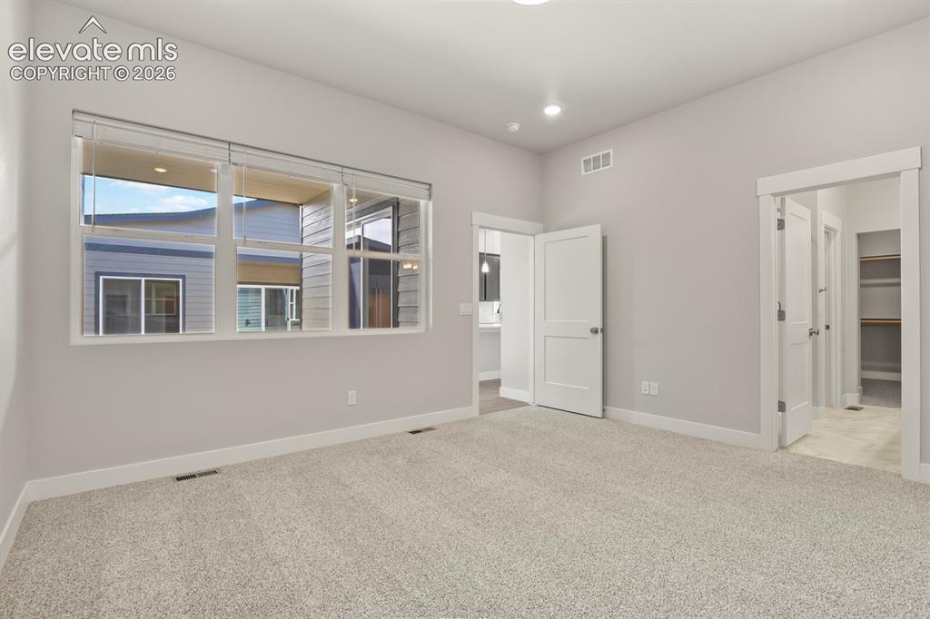 Image 34 of 40: Master Bedroom