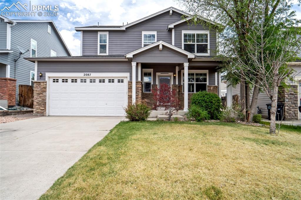 Image 1 of 48: Great landscaping with decorative bushes and soon to come green grass