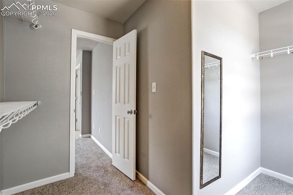 Image 25 of 48: Primary Closet is a great use of space
