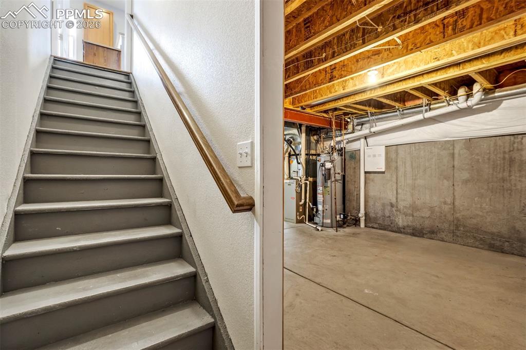 Image 38 of 48: Stairs to Basement