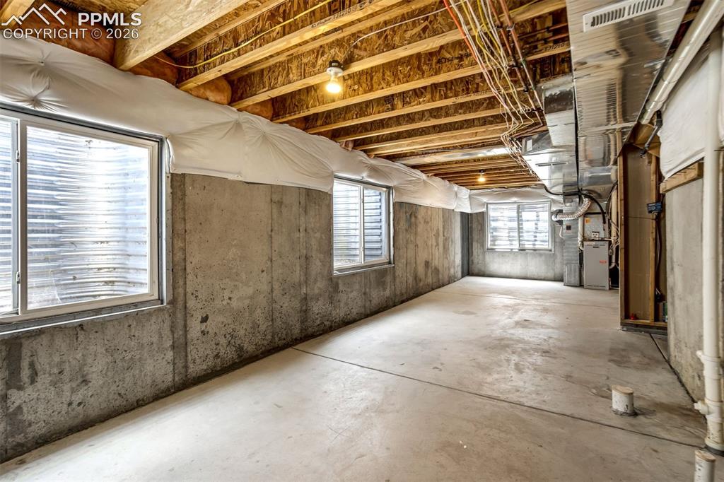 Image 41 of 48: Custom made window wells on all basement windows
