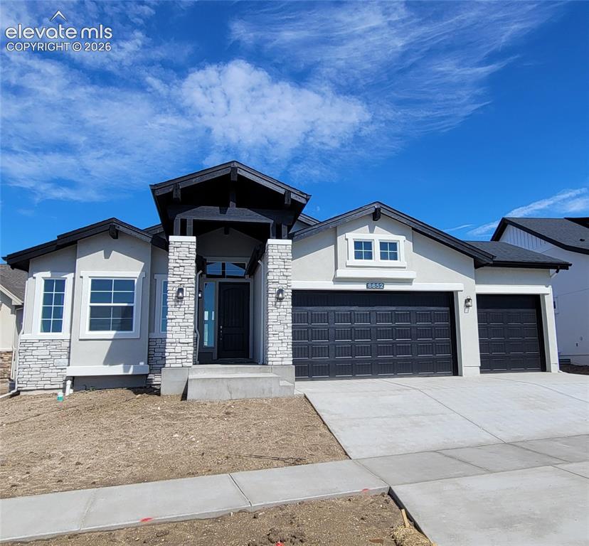 Image 1 of 47: Falkirk-Ranch Plan-Craftsman Elevation-3 Car Garage!
