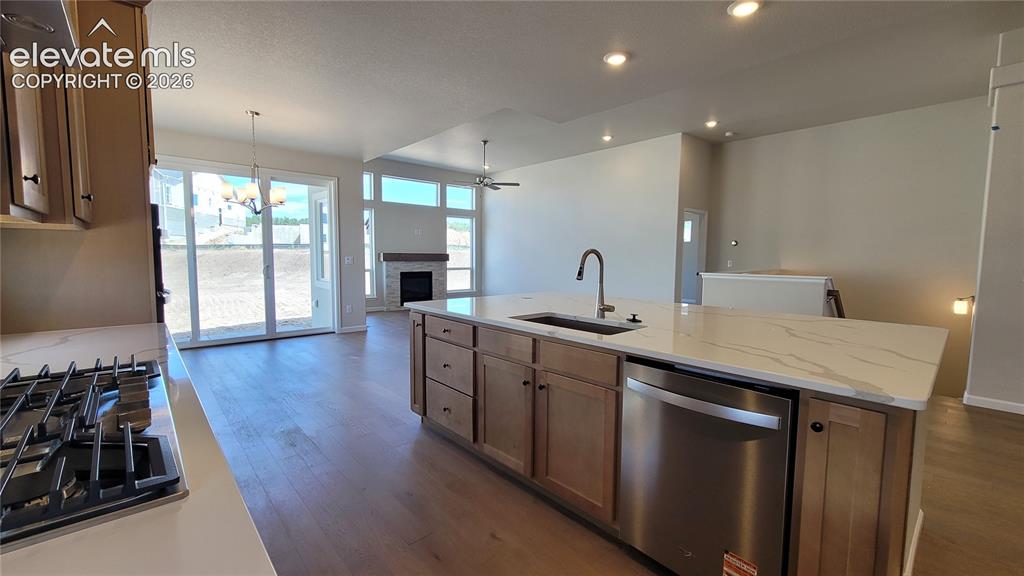 Image 7 of 47: Gourmet Kitchen with quartz countertops, pantry, huge island providing addi
