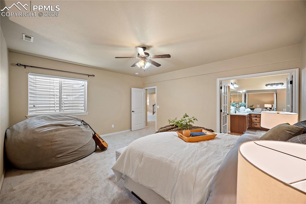 Image 24 of 29: Junior Master Suite with walk-in closet and 5 Piece bath