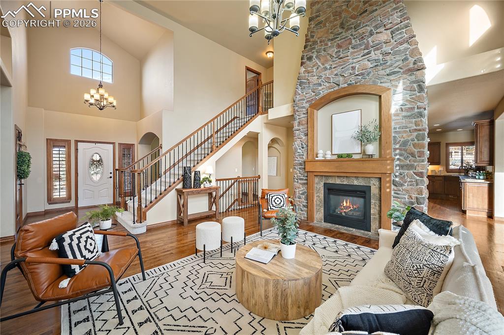 Image 6 of 29: Stunning floor to ceiling stone fireplace