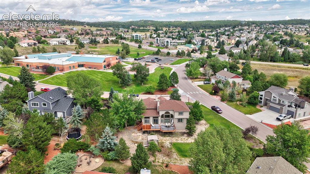 Image 44 of 50: Aerial perspective showcasing a residential community with varied architect