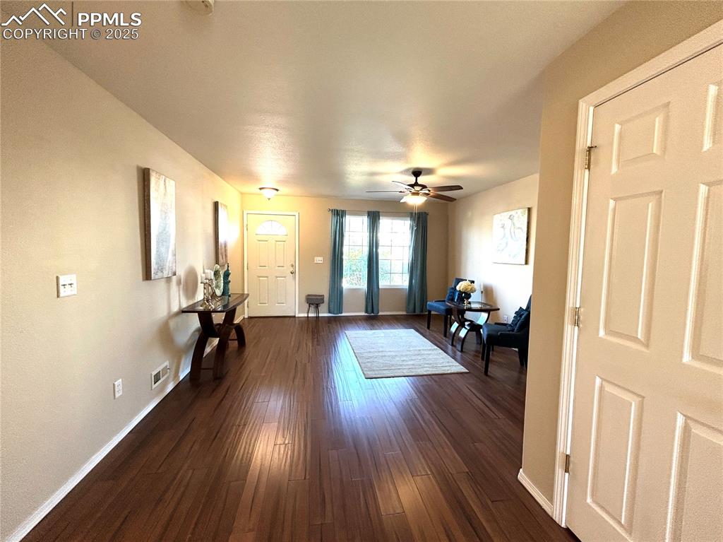 Image 2 of 43: Entrance foyer featuring baseboards, visible vents, dark wood-style floors,