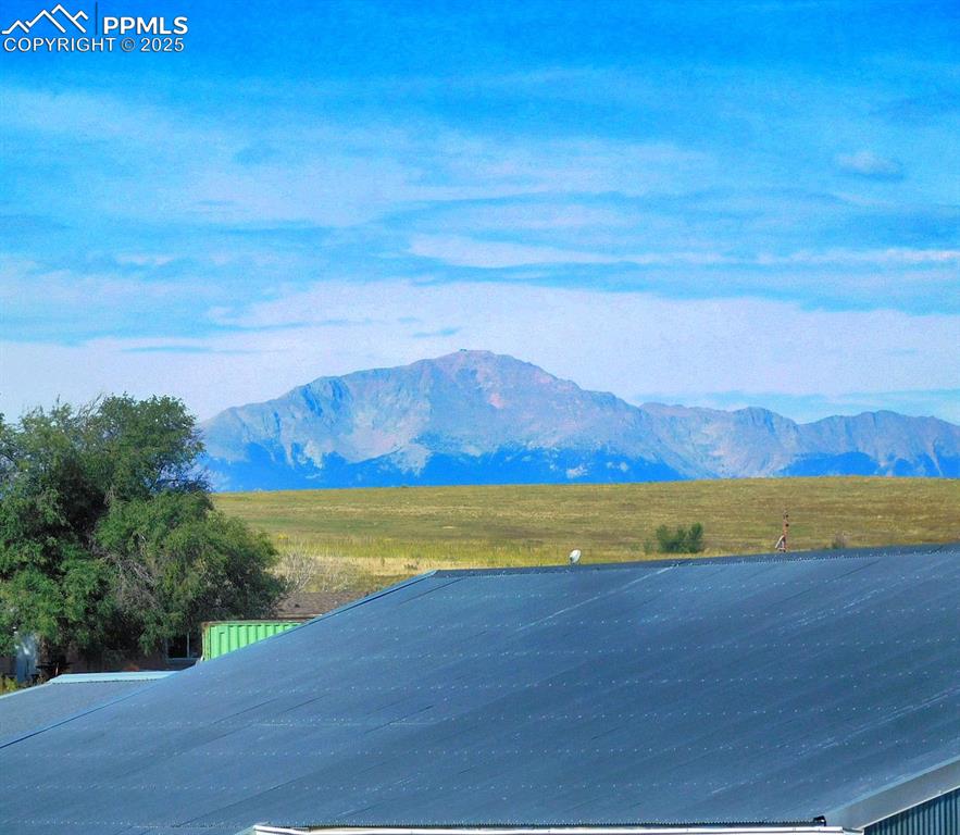 Image 20 of 20: View of Pikes Peak from rear deck
