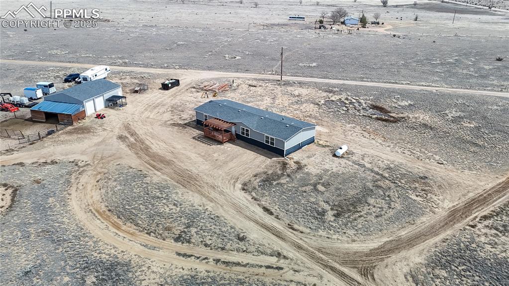 Image 3 of 40: View of rural area with a desert landscape