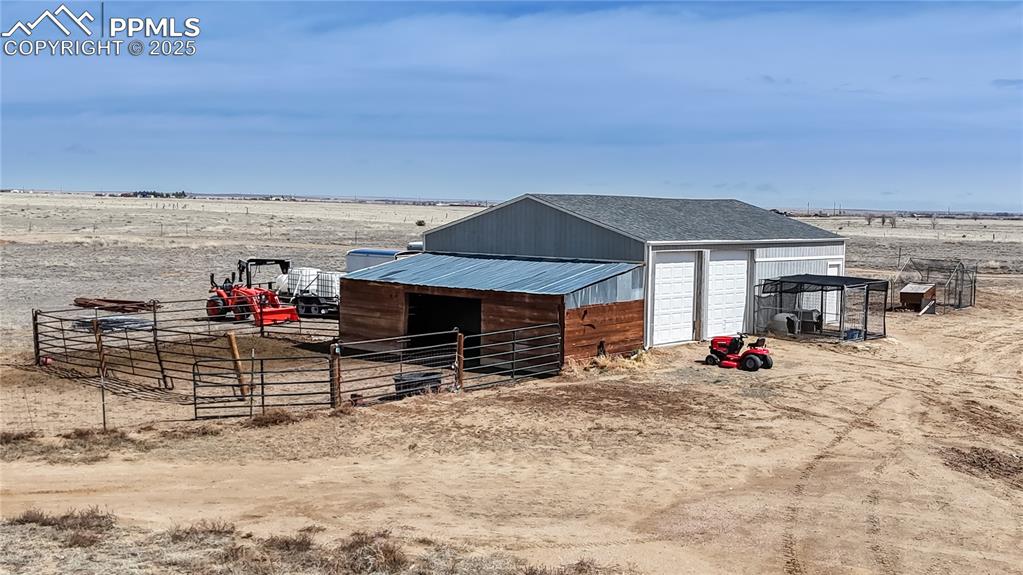 Image 32 of 40: Horse barn with a view of rural / pastoral area