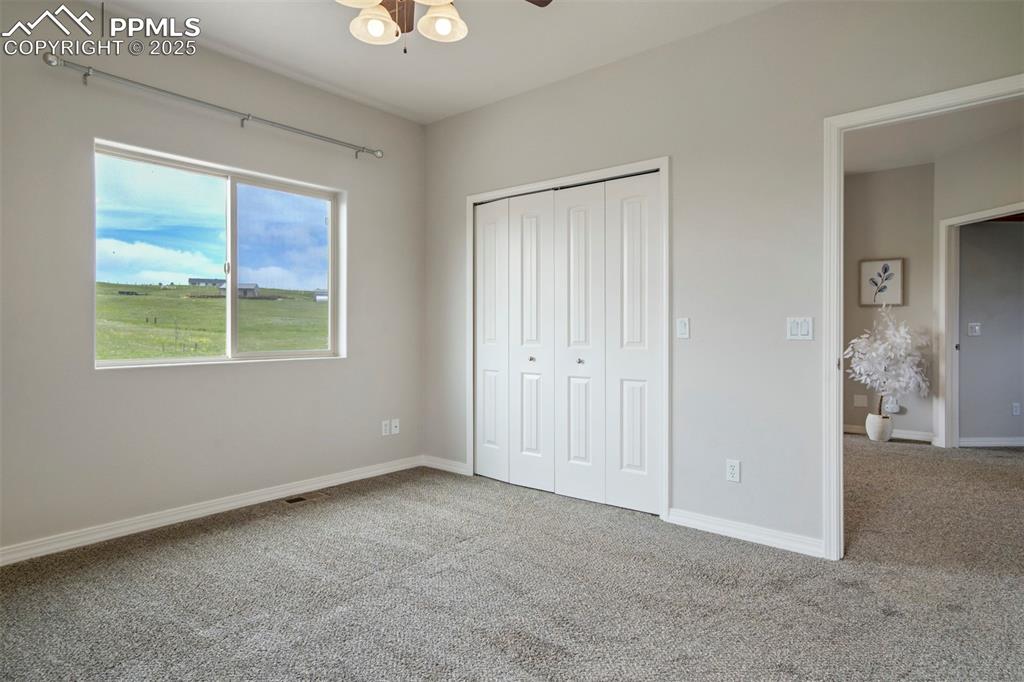Image 16 of 43: Upper level bedroom