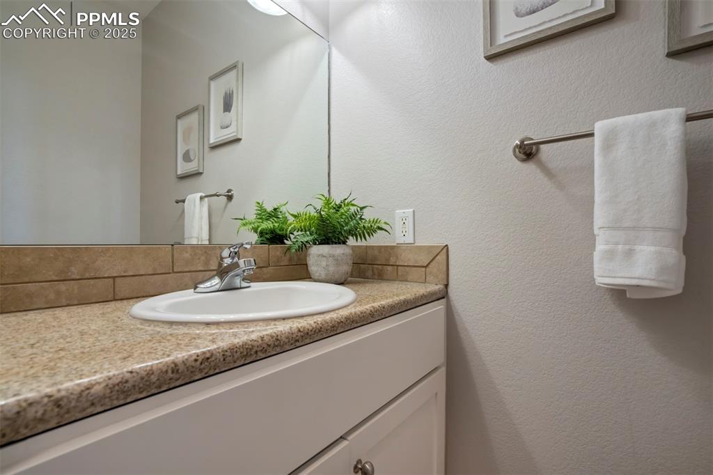 Image 9 of 43: Main level half bath